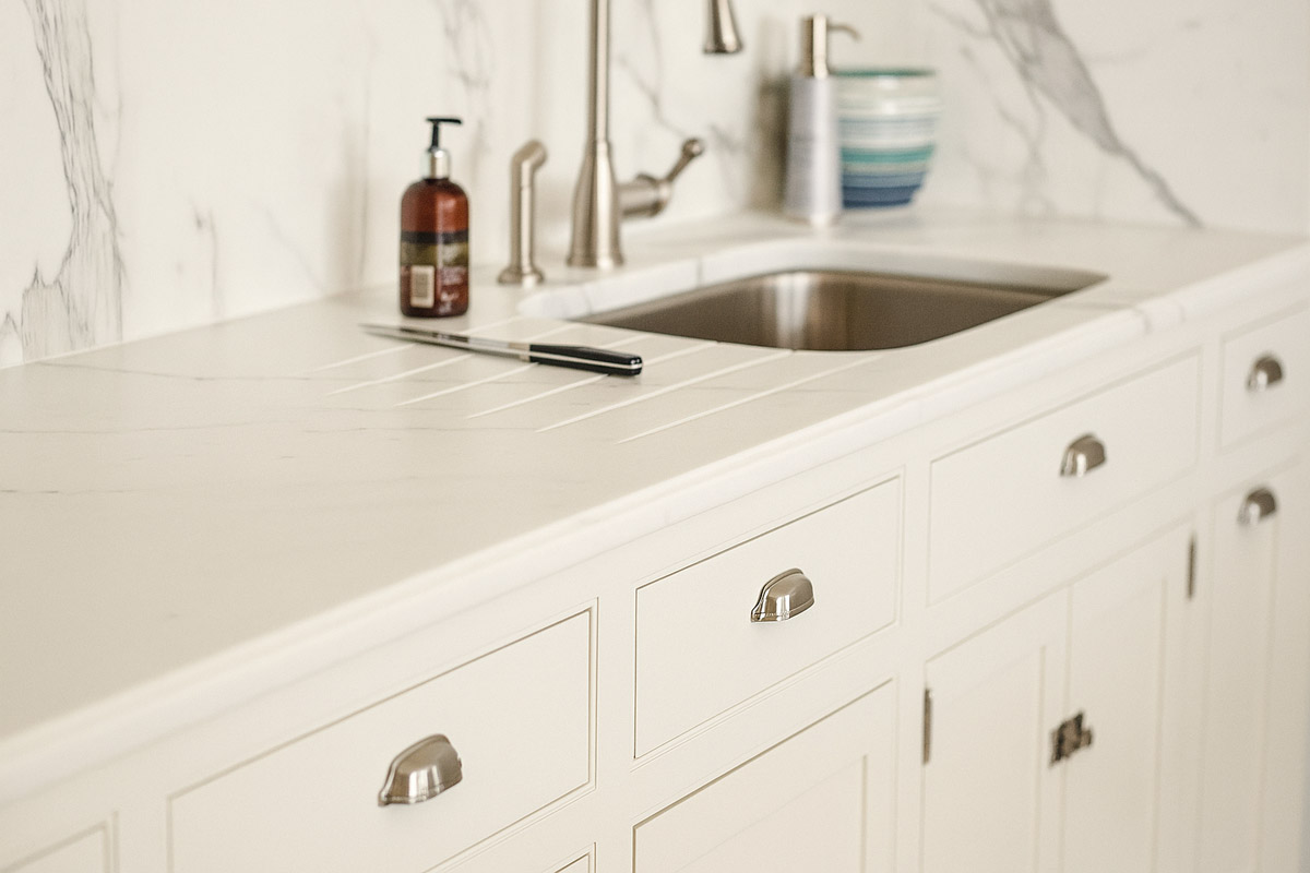 Modern kitchen sink with sleek faucet and quartz countertop